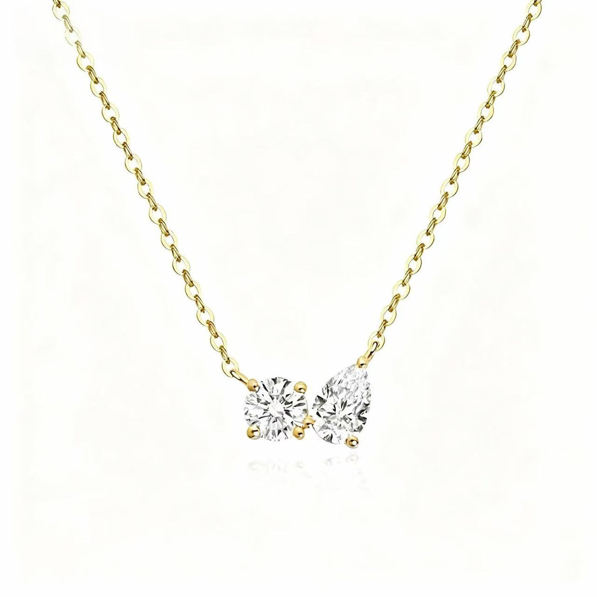 The Story Behind the Elegant Duet Round & Pear Necklace