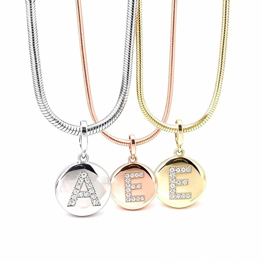 The Story Behind the Round Initial Pendant