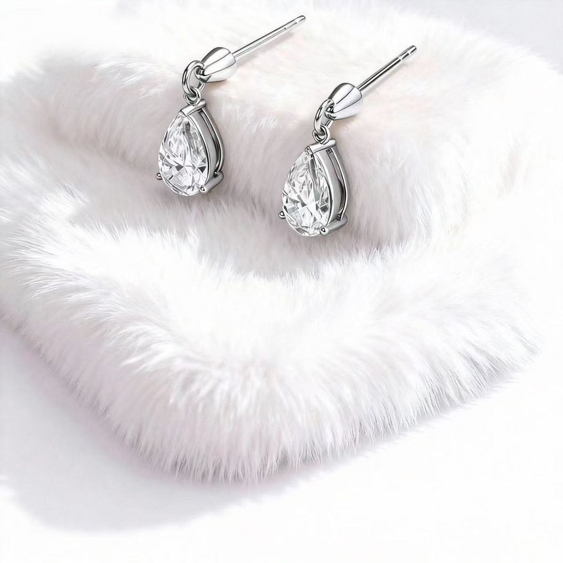 The Story Behind the Single Tear Pear Earrings