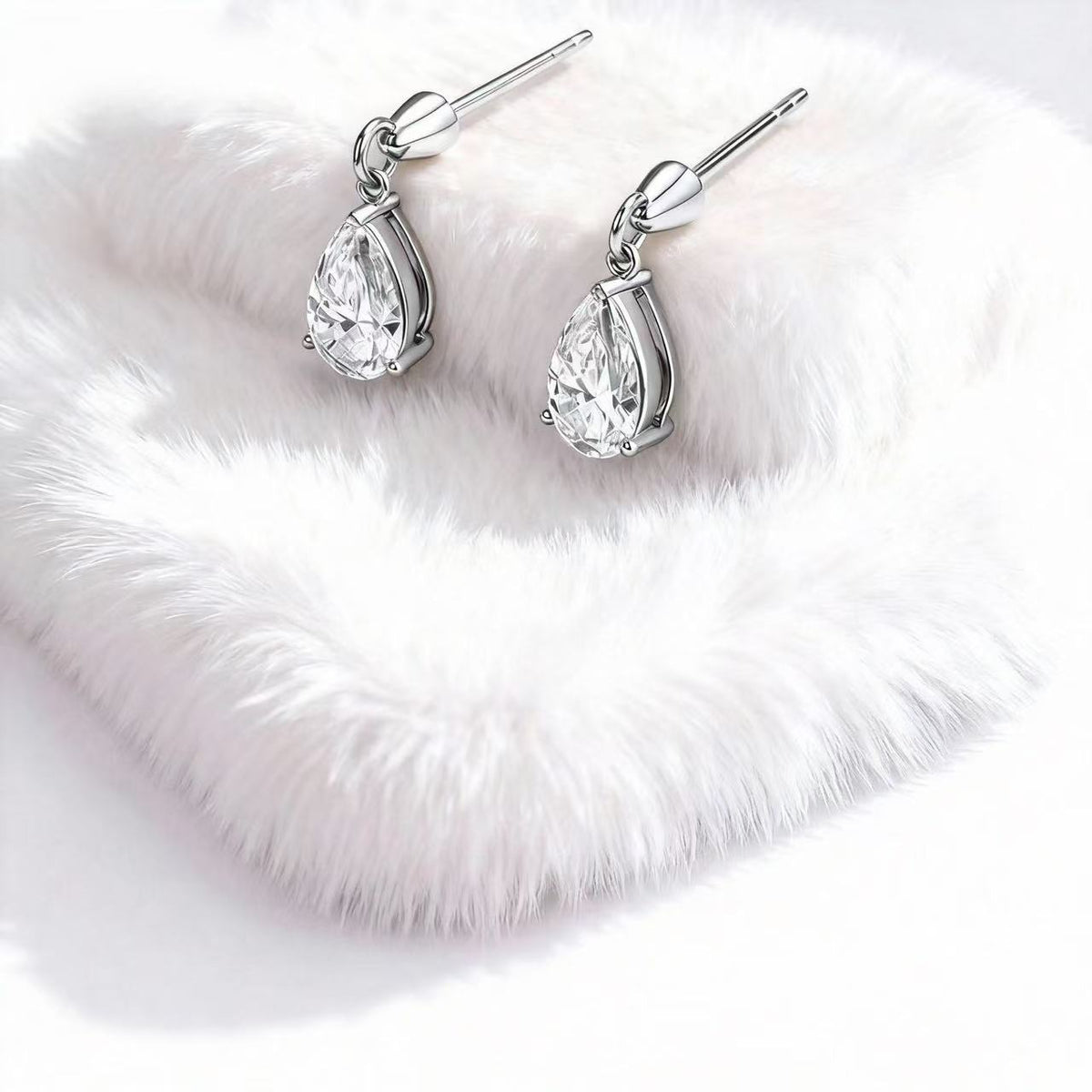 The Story Behind the Single Tear Pear Earrings