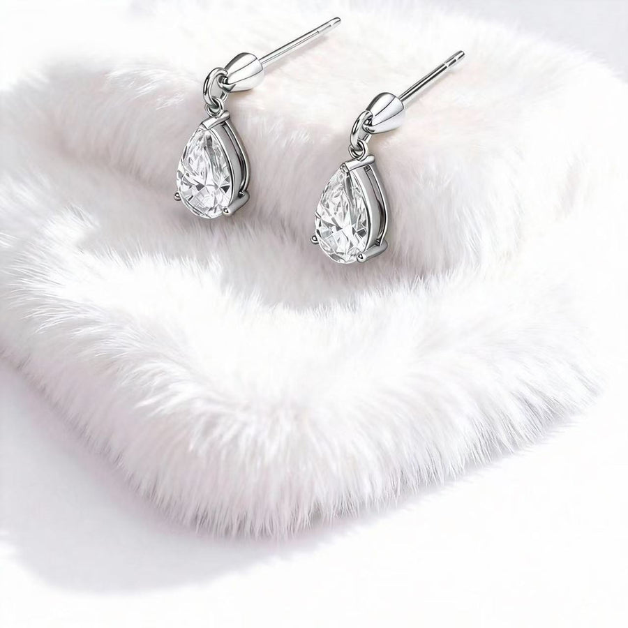 The Story Behind the Single Tear Pear Earrings