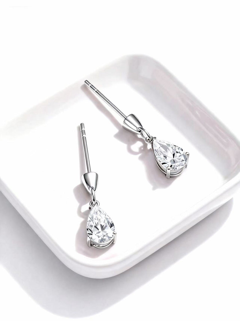 Aetheris Single Tear Pear lab-grown diamond earrings photographed as an original product view