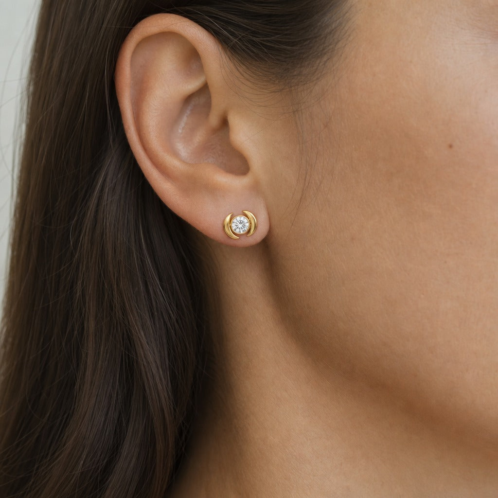 Aetheris Waxing and Waning Moon Studs, round lab-grown diamond stud earrings, worn on the ear, side view