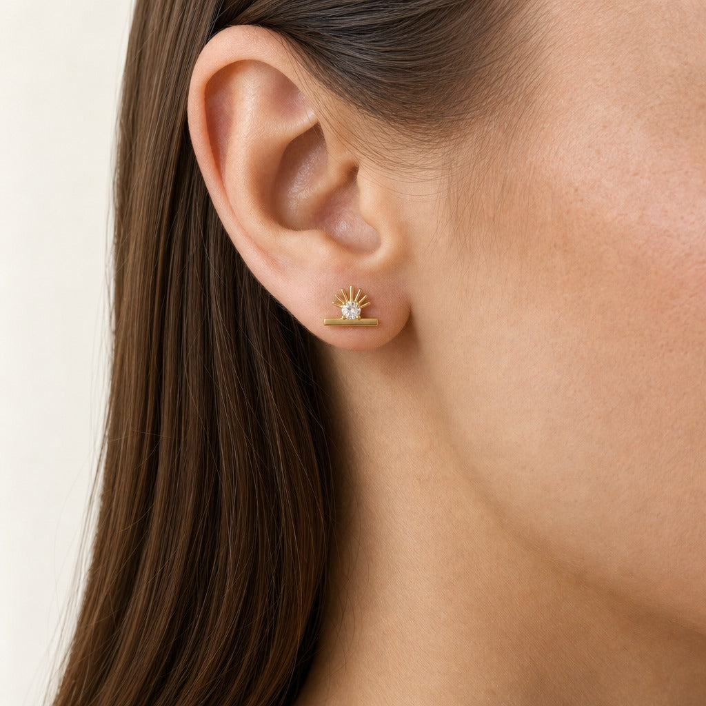 Aetheris First Light Sun Studs, round lab-grown diamond stud earrings, worn on the ear, side view