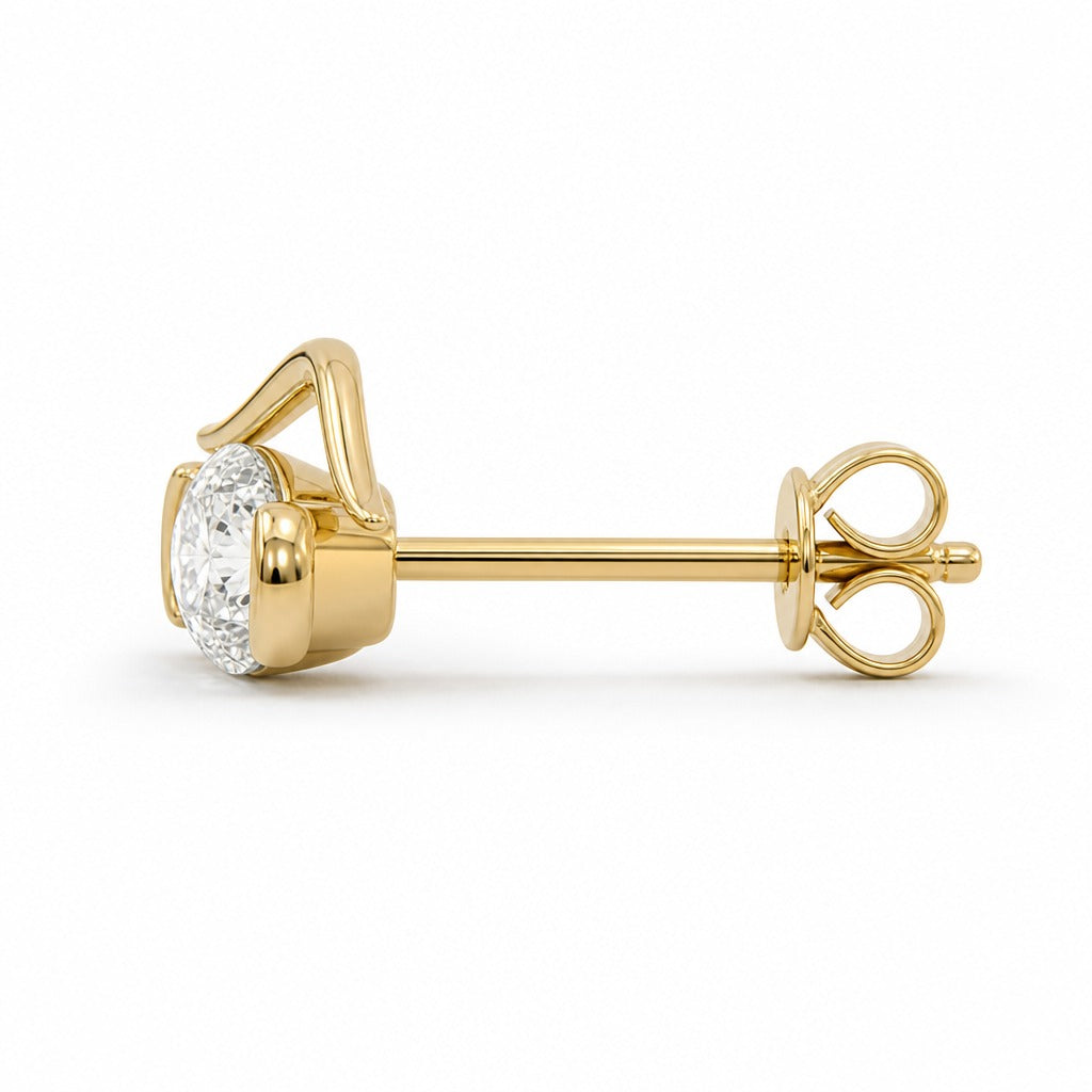 Aetheris Turning Crest Wave Studs, oval lab-grown diamond stud earrings, side profile showing the post and push-back